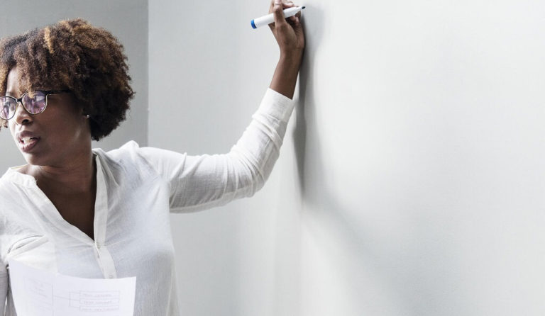 Woman Leading a Team Meeting