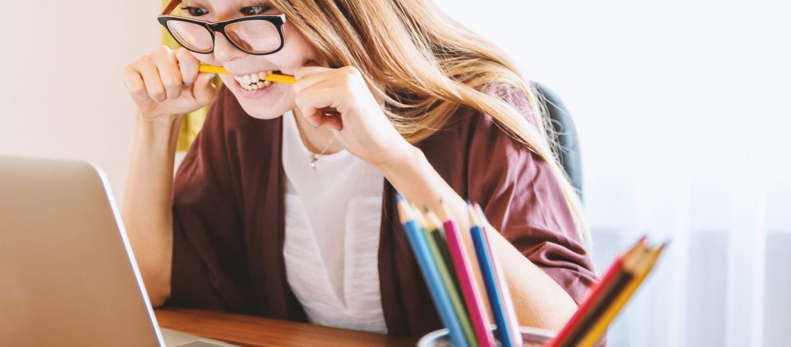 Stressed Out Employee Biting a Pencil