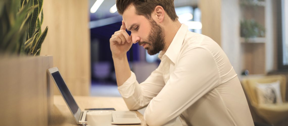 Employee Concentrating on His Computer