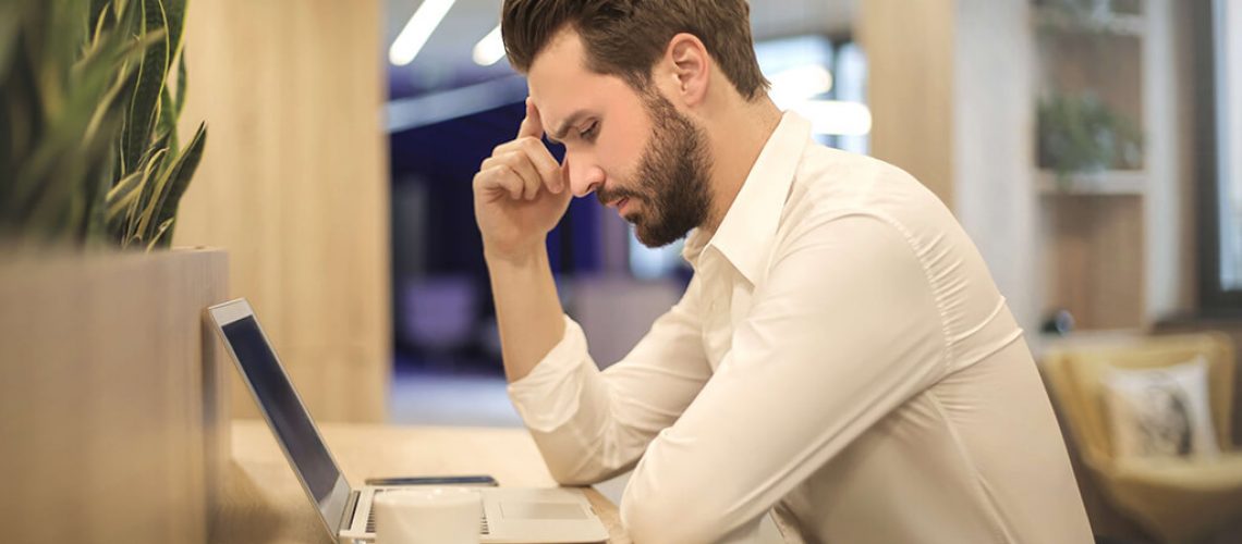 Employee Concentrating on His Computer