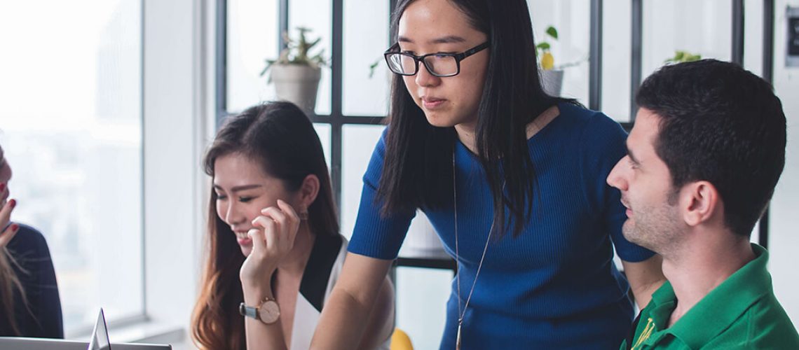 Two Employees Teaming Up Together